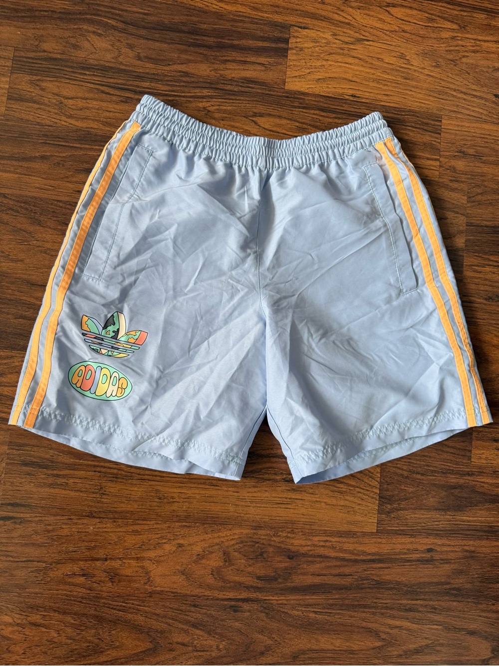 adidas Light Blue Athletic Shorts with Yellow/orange Side Stripes